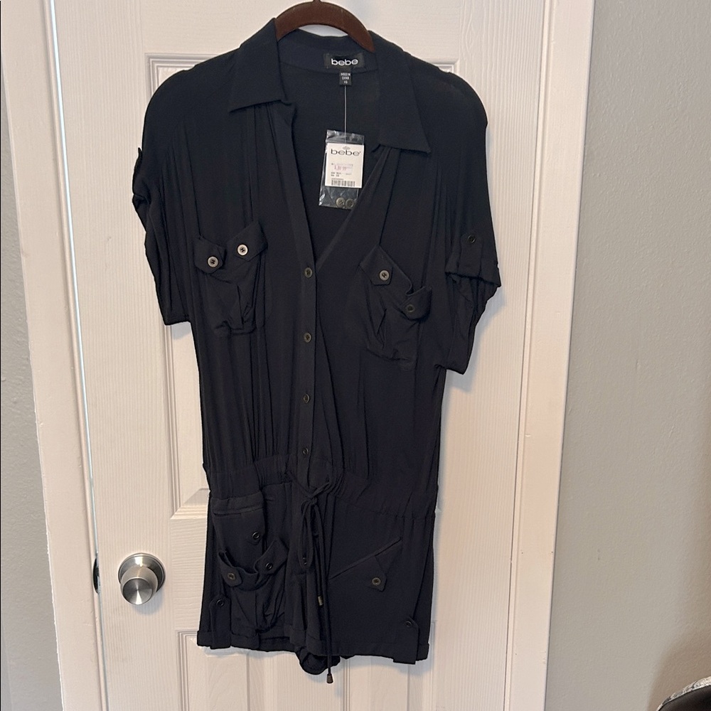 NWT. Bebe Black Button-Up Romper.